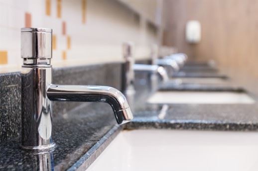 sinks in a commercial building bathroom